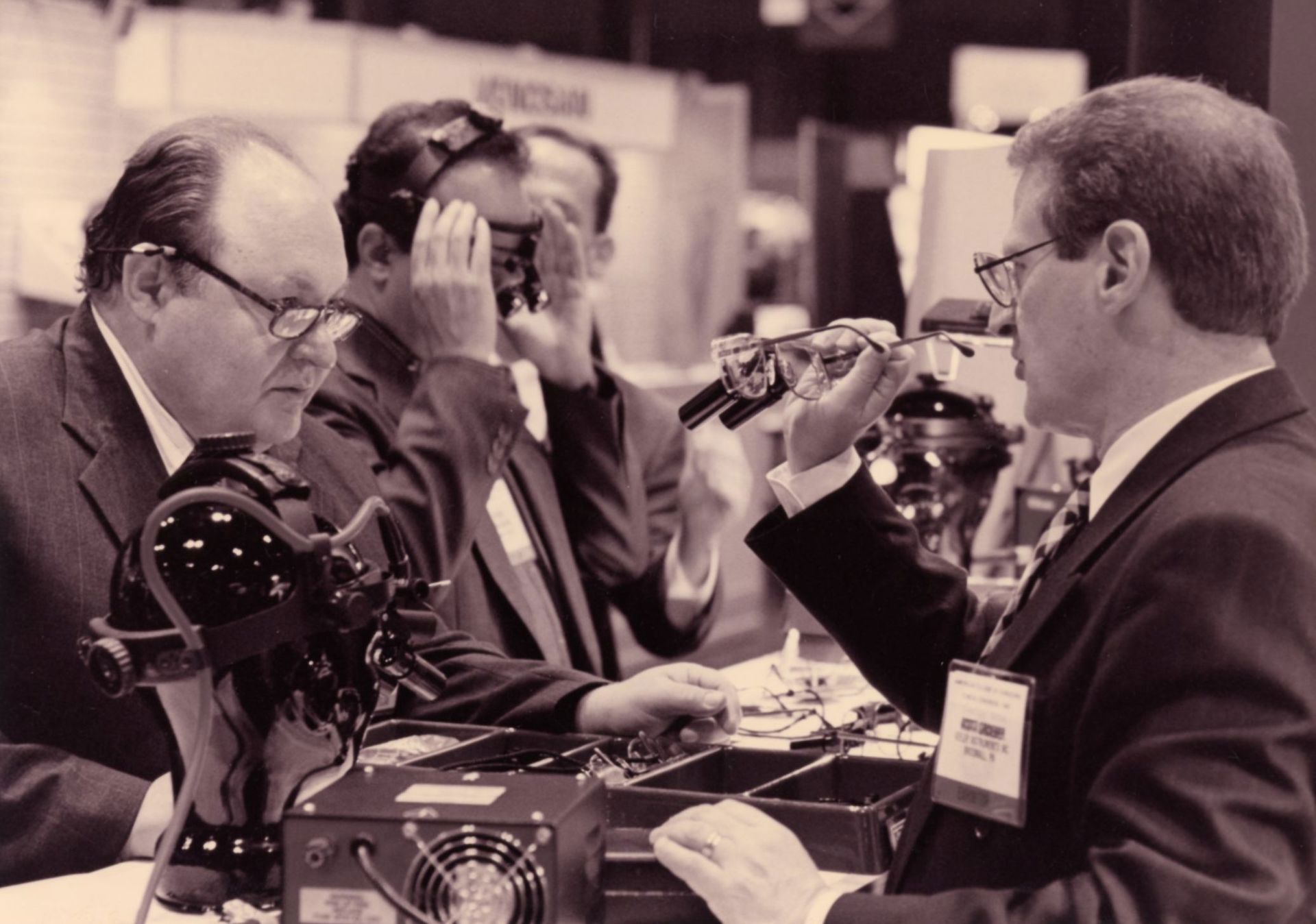 attendees-trying-on-surgical-glasses.jpg